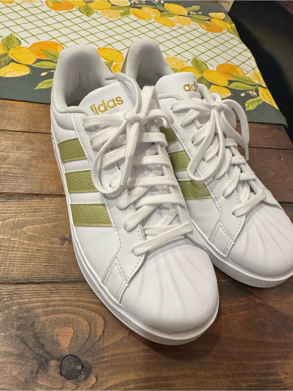ADIDAS White Sneakers with Gold Stripes